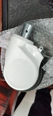 Echador médico de las piezas de la cama de hospital rueda plástica muda de 5 pulgadas con la cubierta externa del ABS del freno