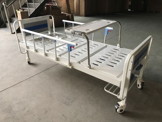 Cama de hospital manual médica de dos funciones con dos manivelas y sobre la tabla de la cama