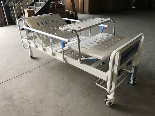 Cama de hospital manual médica de dos funciones con dos manivelas y sobre la tabla de la cama