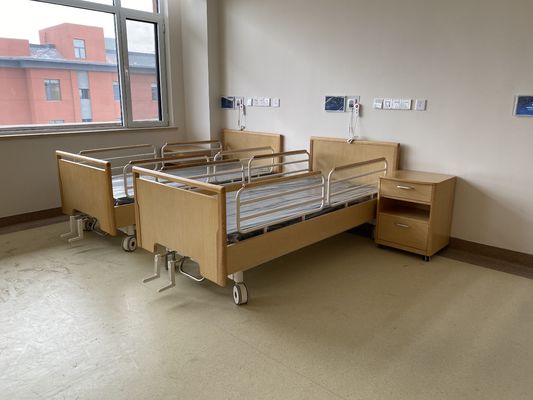 El lecho de enfermo manual del oficio de enfermera del hogar de la cama de hospital con dos funciones cuida la cama casera